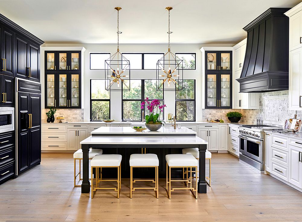 An eclectic black kitchen with golden accessories