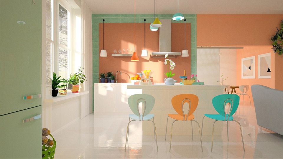 Una cocina escandinava con accesorios de colores