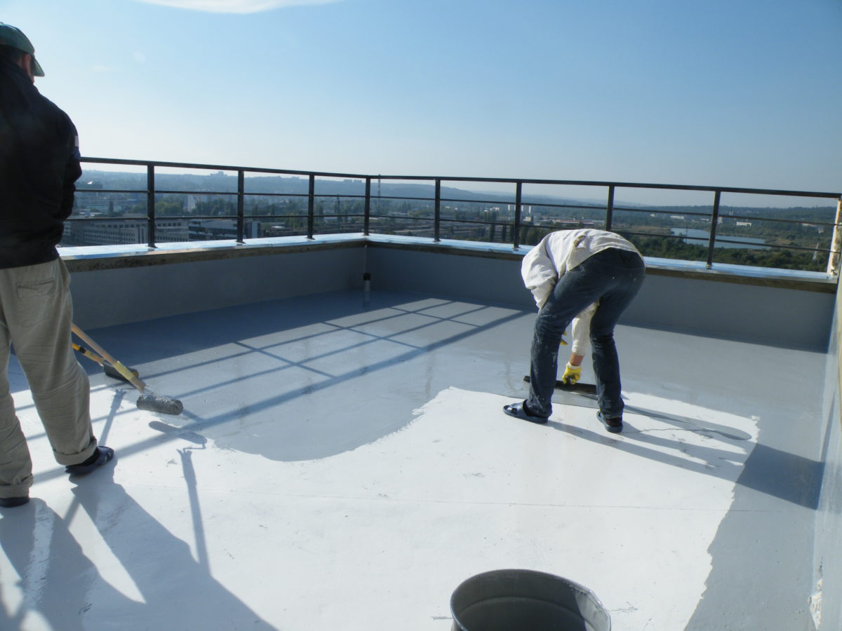 Fabrication d'une couche de revêtement de sol extérieur